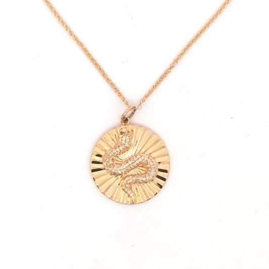 Snake Pendant Necklace with Diamond and Emerald Eyes