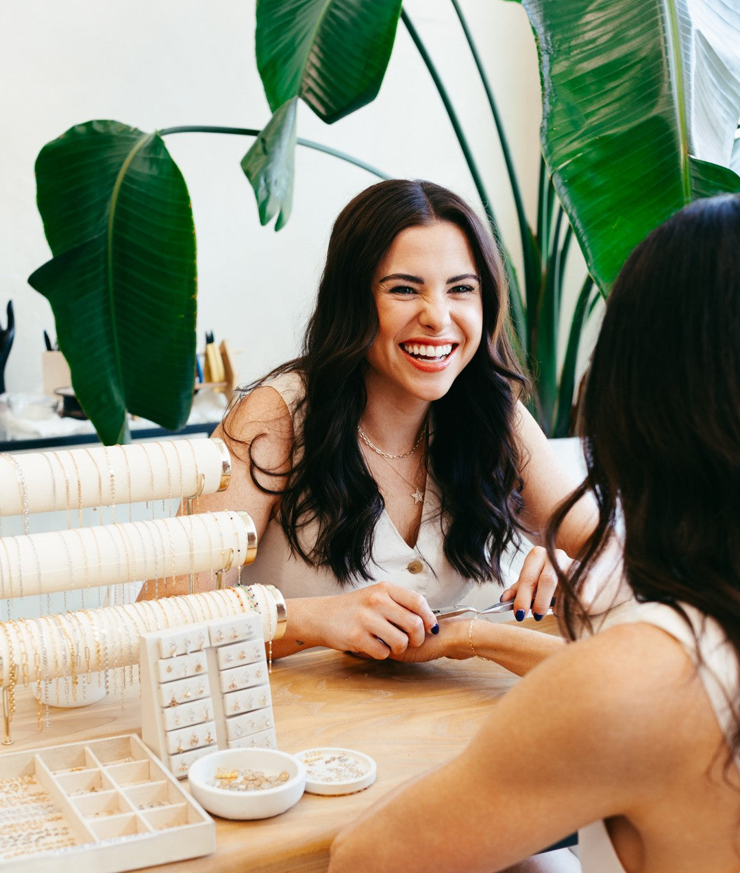 Woman getting a permanent bracelet welded at Nashelle jewelry studio