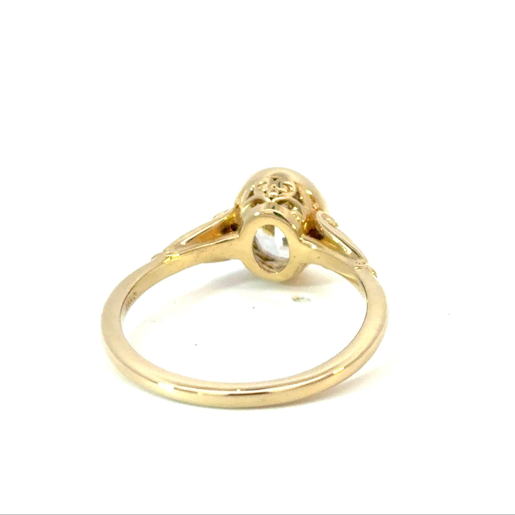 Filligree Oval Accented Engagement Ring with CZ Center Stone