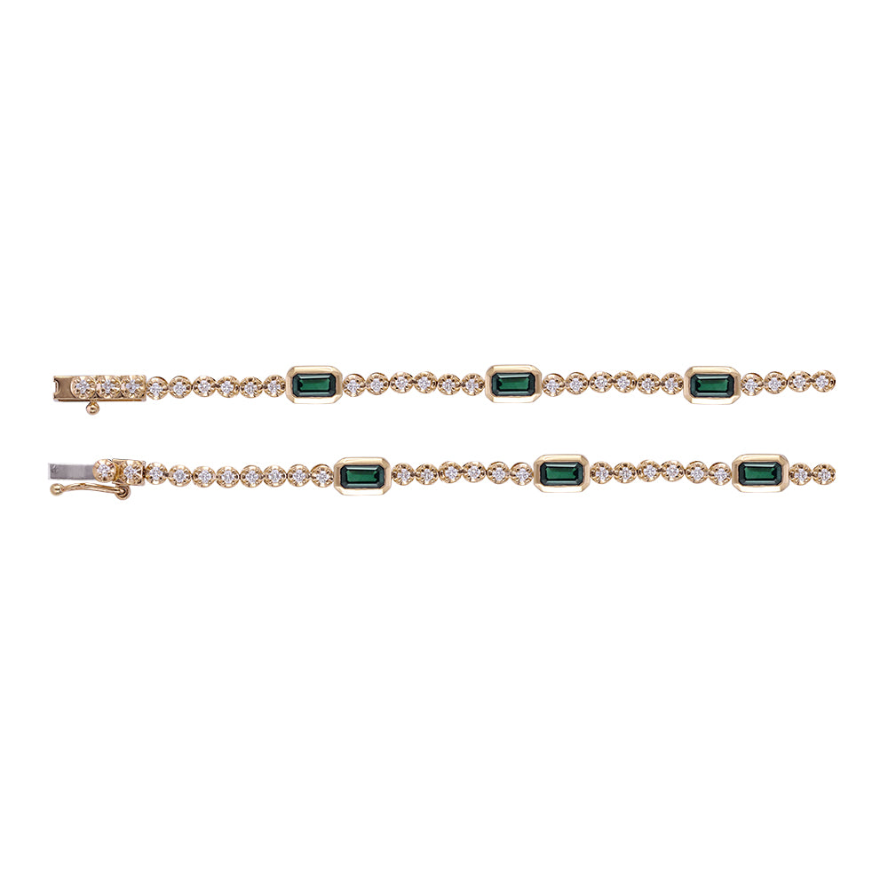 A two-piece display showing a vintage-style yellow gold tennis bracelet with emerald-cut green stones and clear round stones, presented in both flat and angled views on a white background.