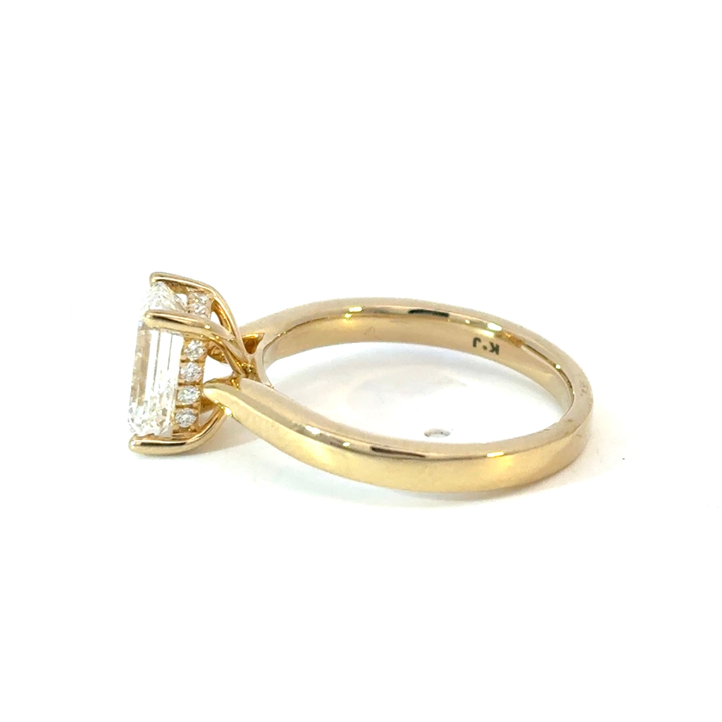 Emerald Cut Diamond Engagement Ring with Hidden Halo