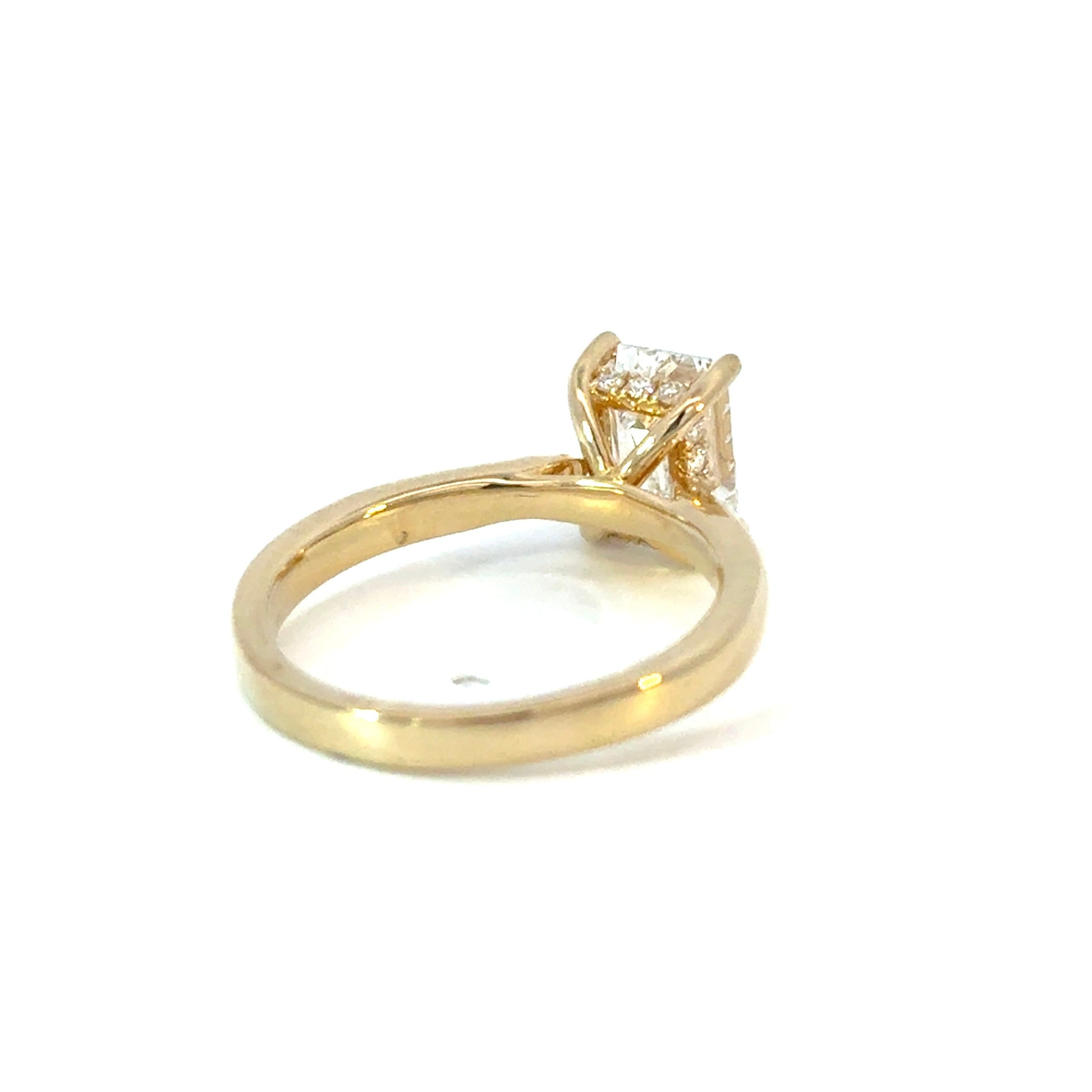 Emerald Cut Diamond Engagement Ring with Hidden Halo