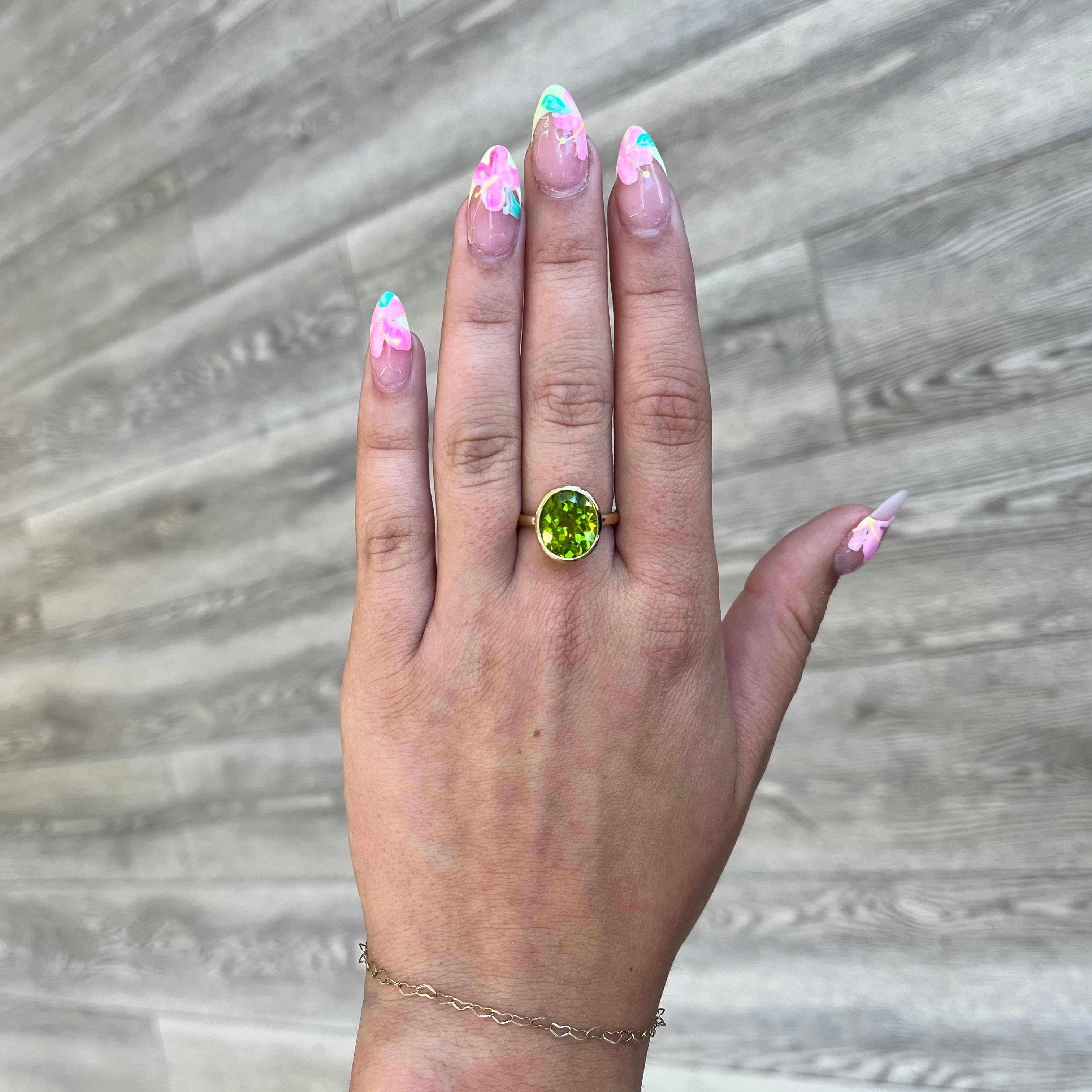 Oval Peridot Bezel Ring