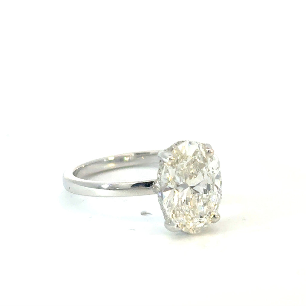 Oval Cut Diamond Engagement Ring with Hidden Halo
