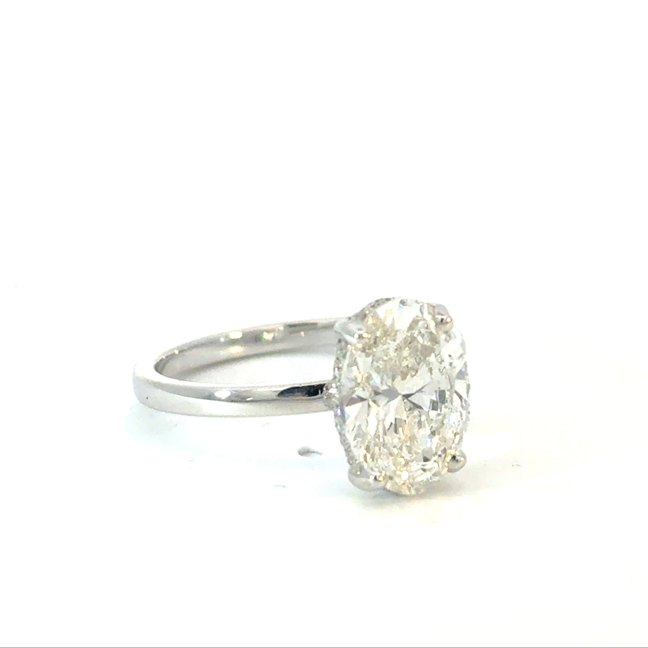 Oval Cut Diamond Engagement Ring with Hidden Halo