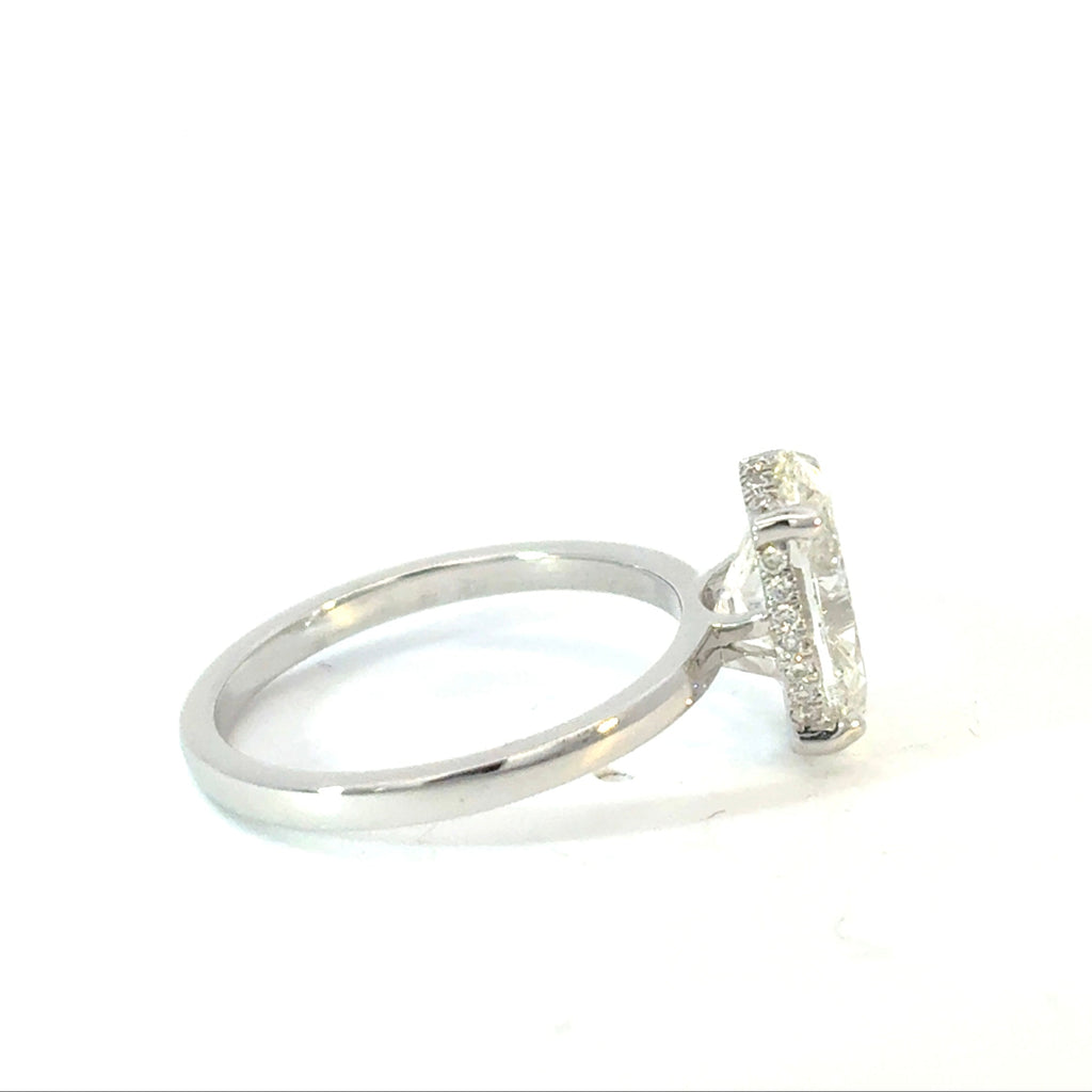 Oval Cut Diamond Engagement Ring with Hidden Halo