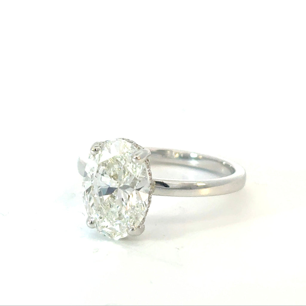 Oval Cut Diamond Engagement Ring with Hidden Halo