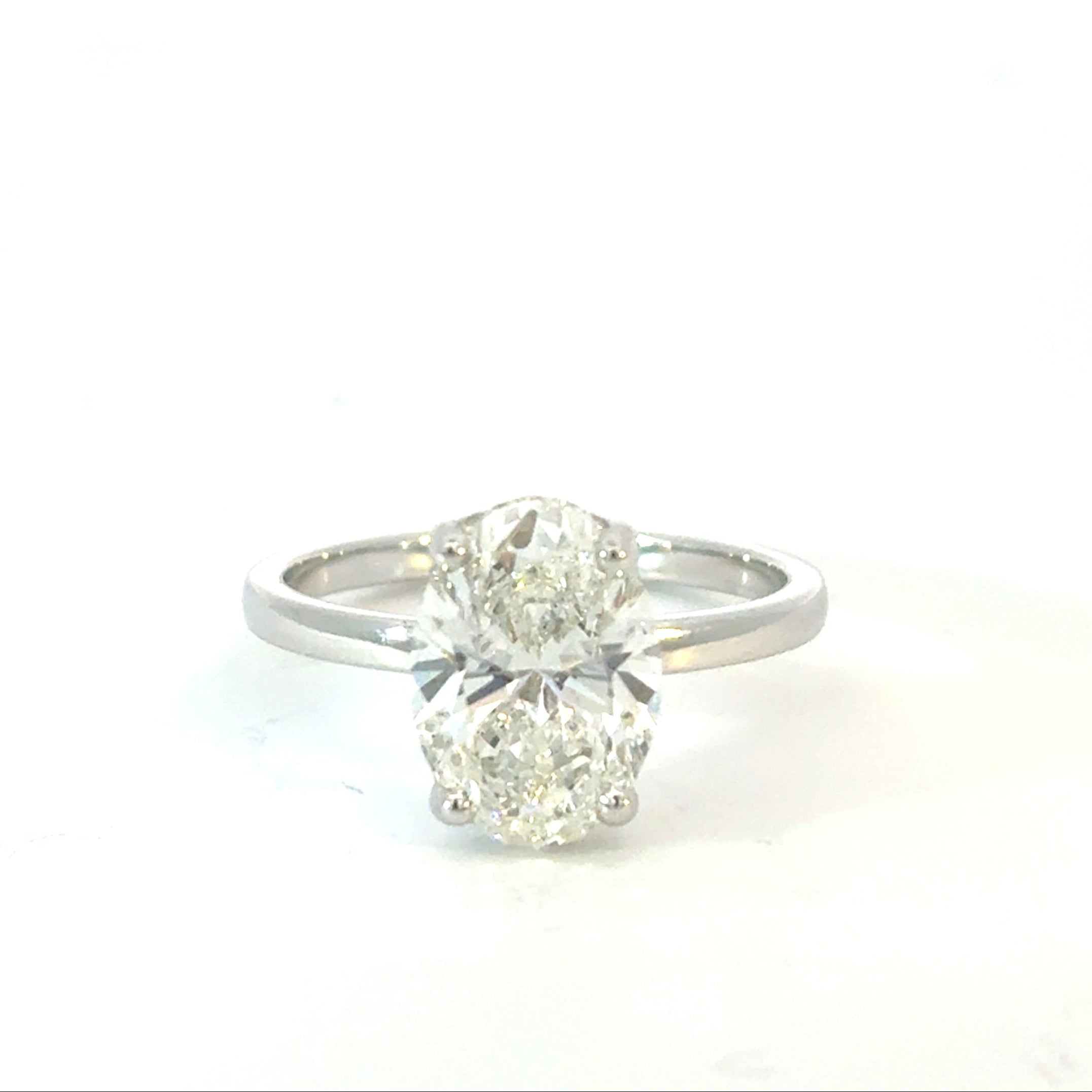 Oval Cut Diamond Engagement Ring with Hidden Halo