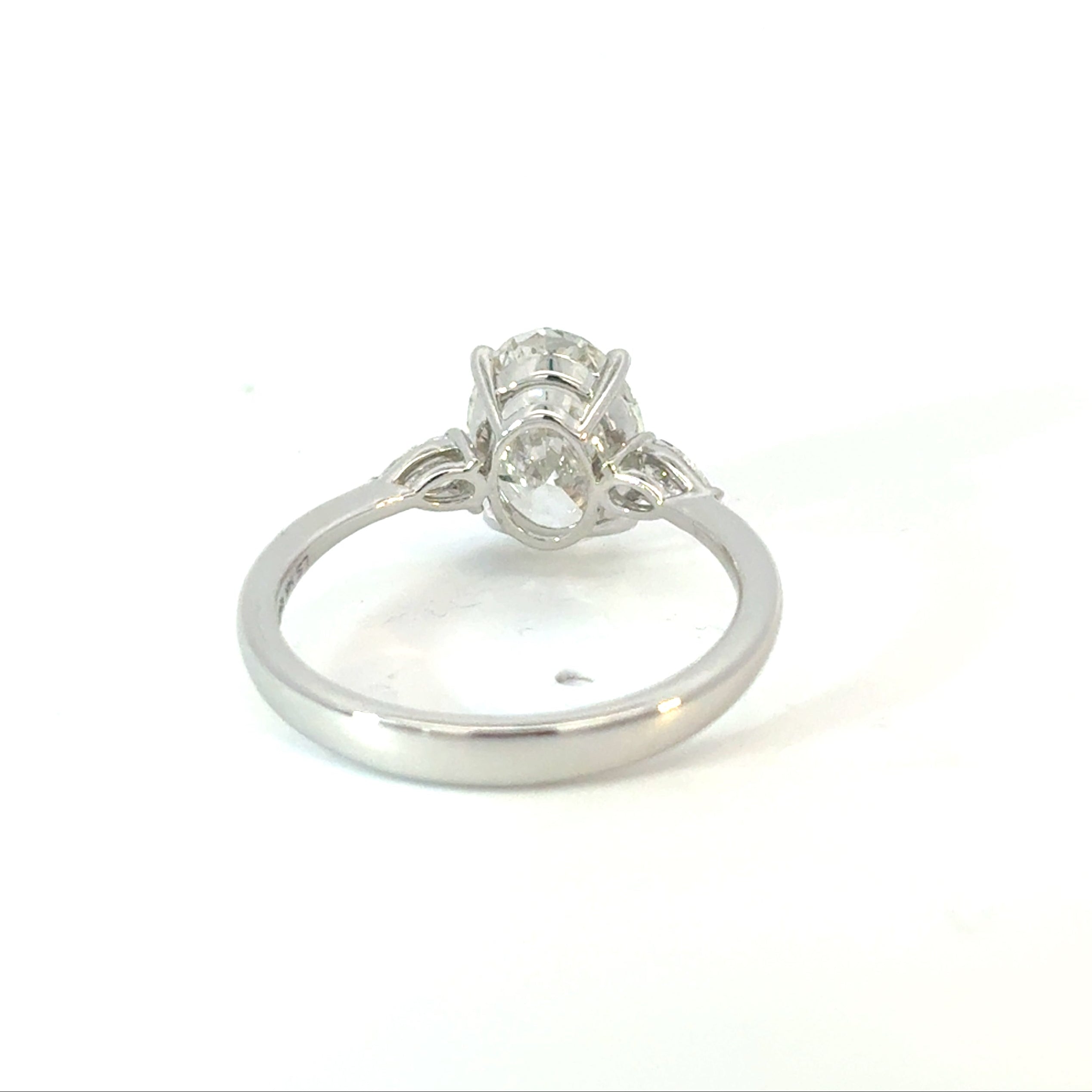 Oval Cut Diamond Engagement Ring with Pear Side Stones