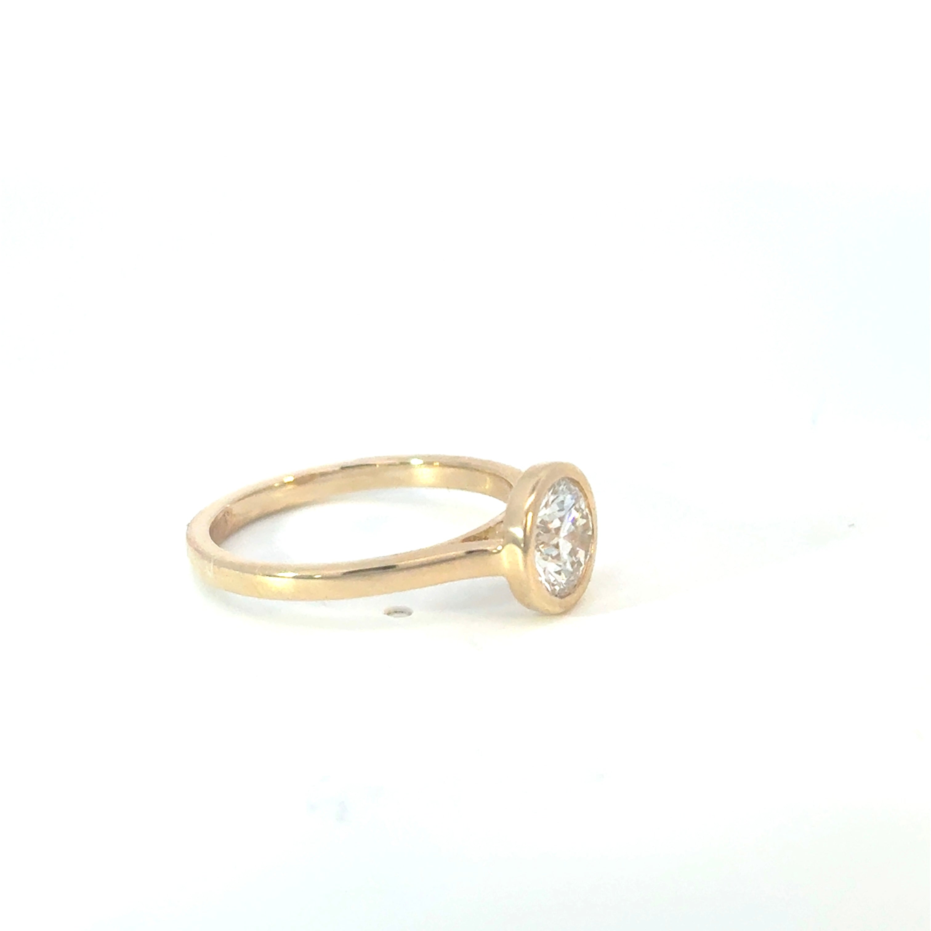 Round Brilliant Cut Diamond Bezel Set Engagement Ring