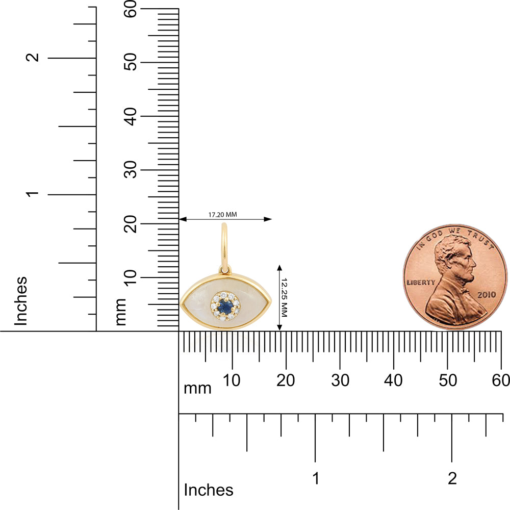 A gold eye-shaped pendant with a white inlay and a central blue gemstone, shown with measurement rulers in inches and millimeters, alongside a U.S.