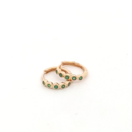 Emerald bezel set huggies
