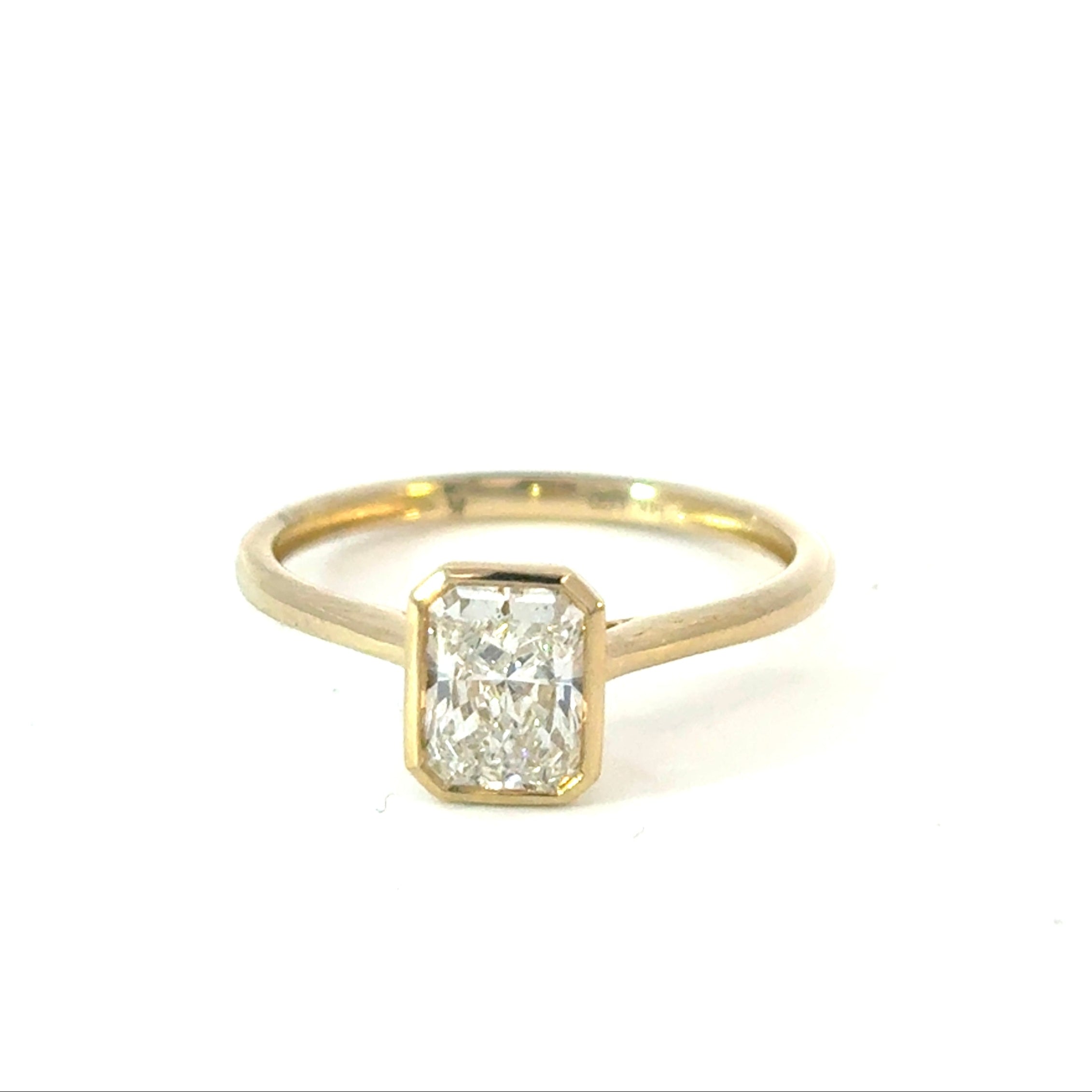 Emerald Cut Diamond Engagement Ring with Hidden Diamond