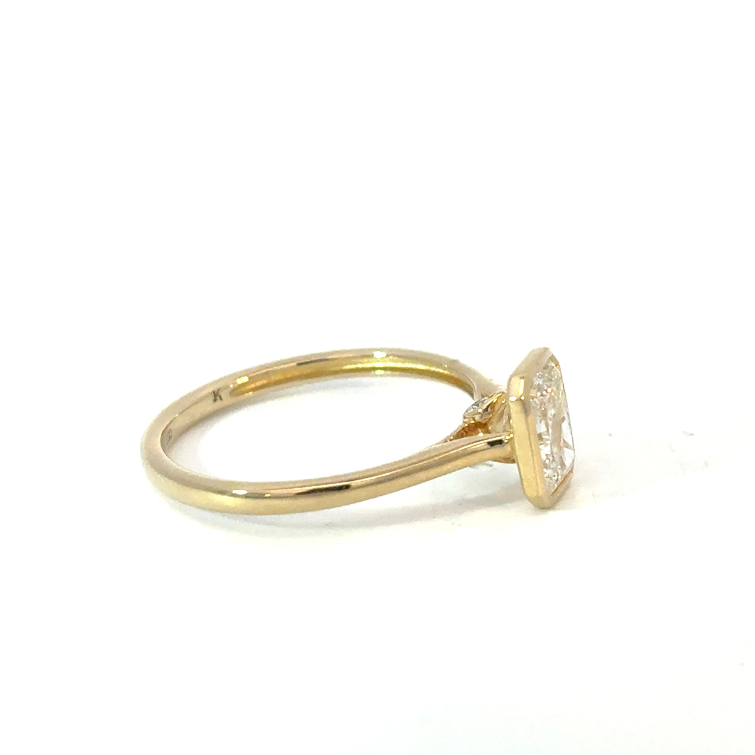 Emerald Cut Diamond Engagement Ring with Hidden Diamond