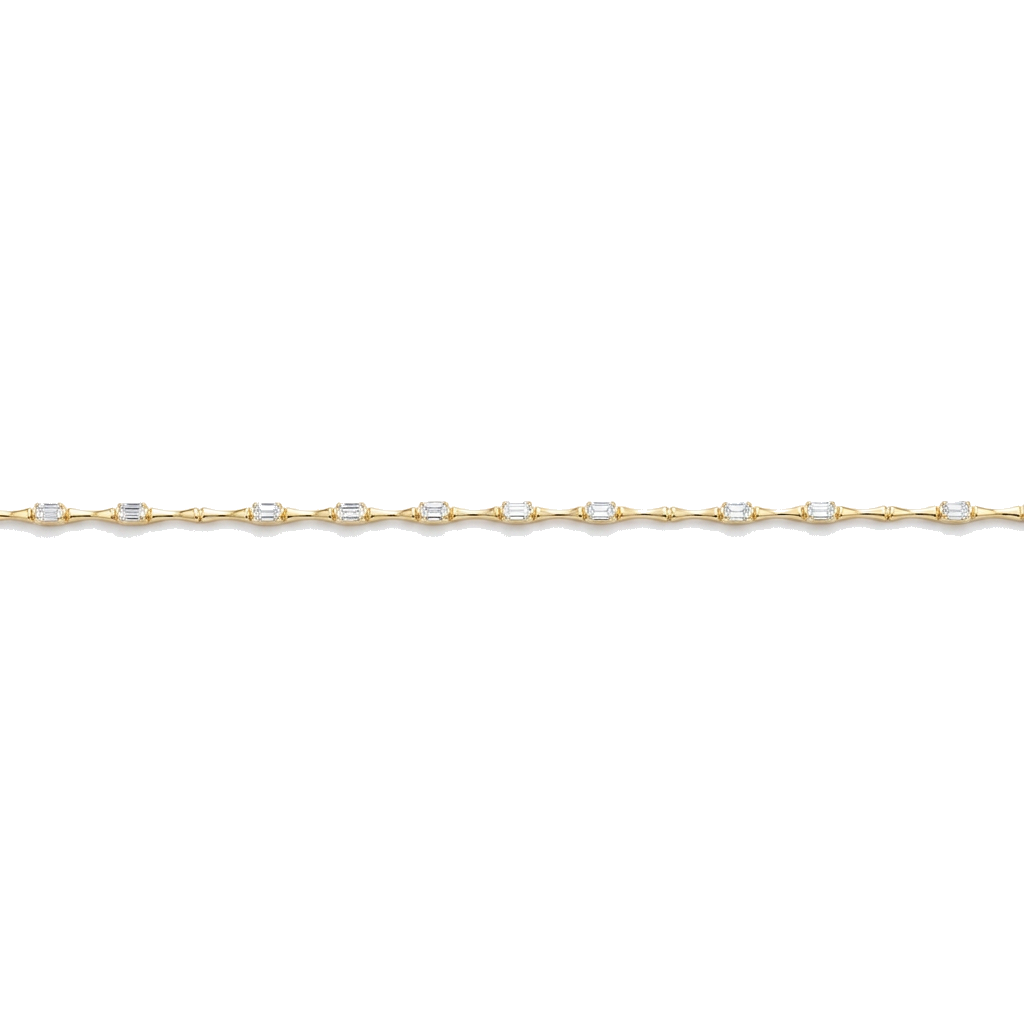 14K yellow gold diamond bar link tennis bracelet with emerald-cut diamonds, laid flat in a straight line on a pure white background