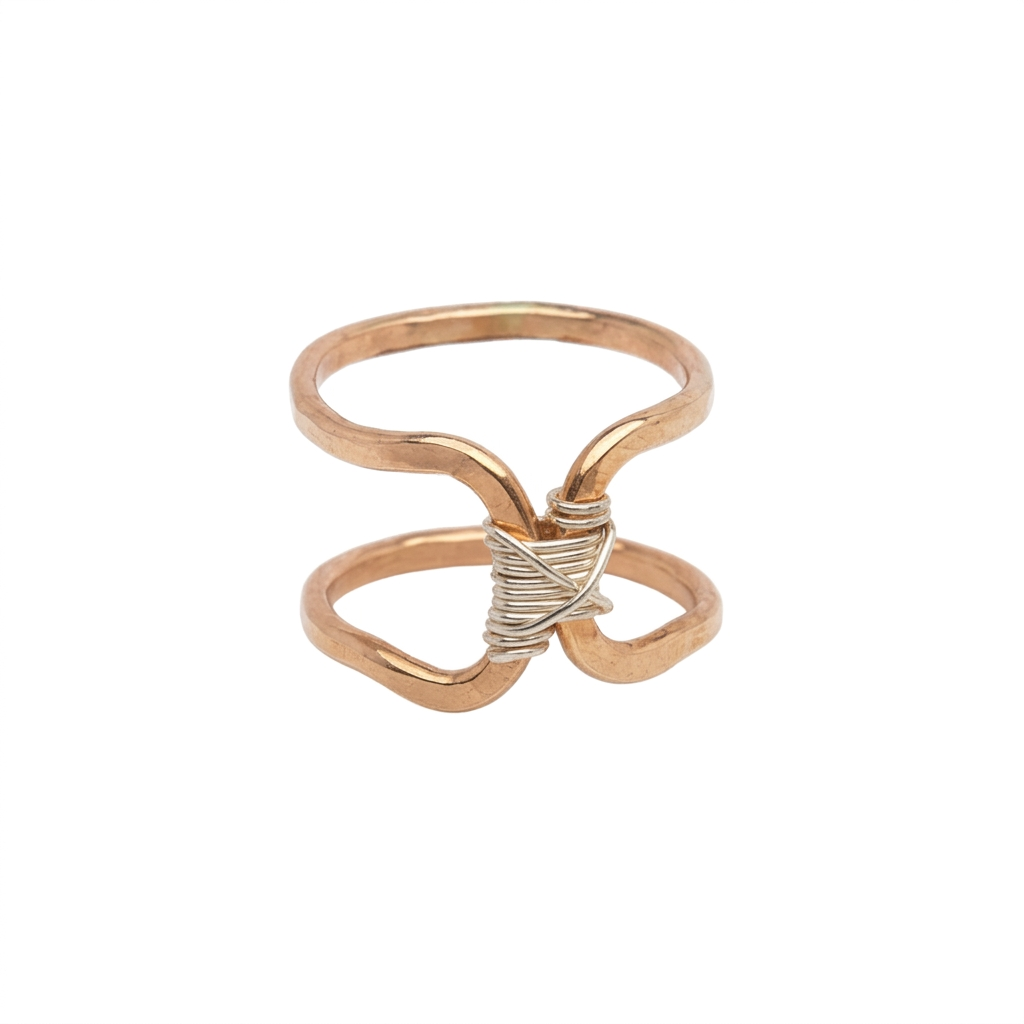 Bound Ring with two hammered gold-toned bands joined by a silver-toned wire wrap on a white background.