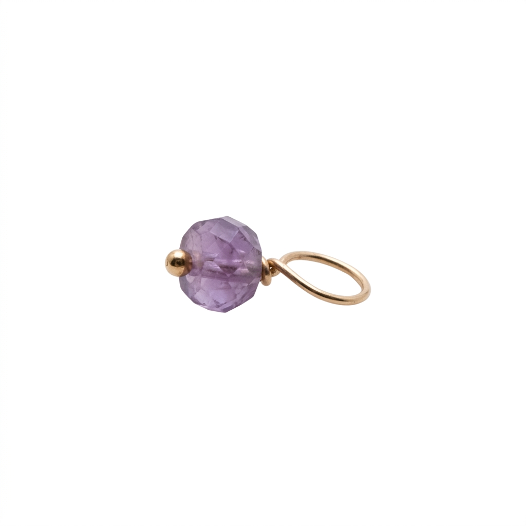 Identity Mini Gem charm featuring a faceted purple gemstone and a gold-toned wire loop on a white background.