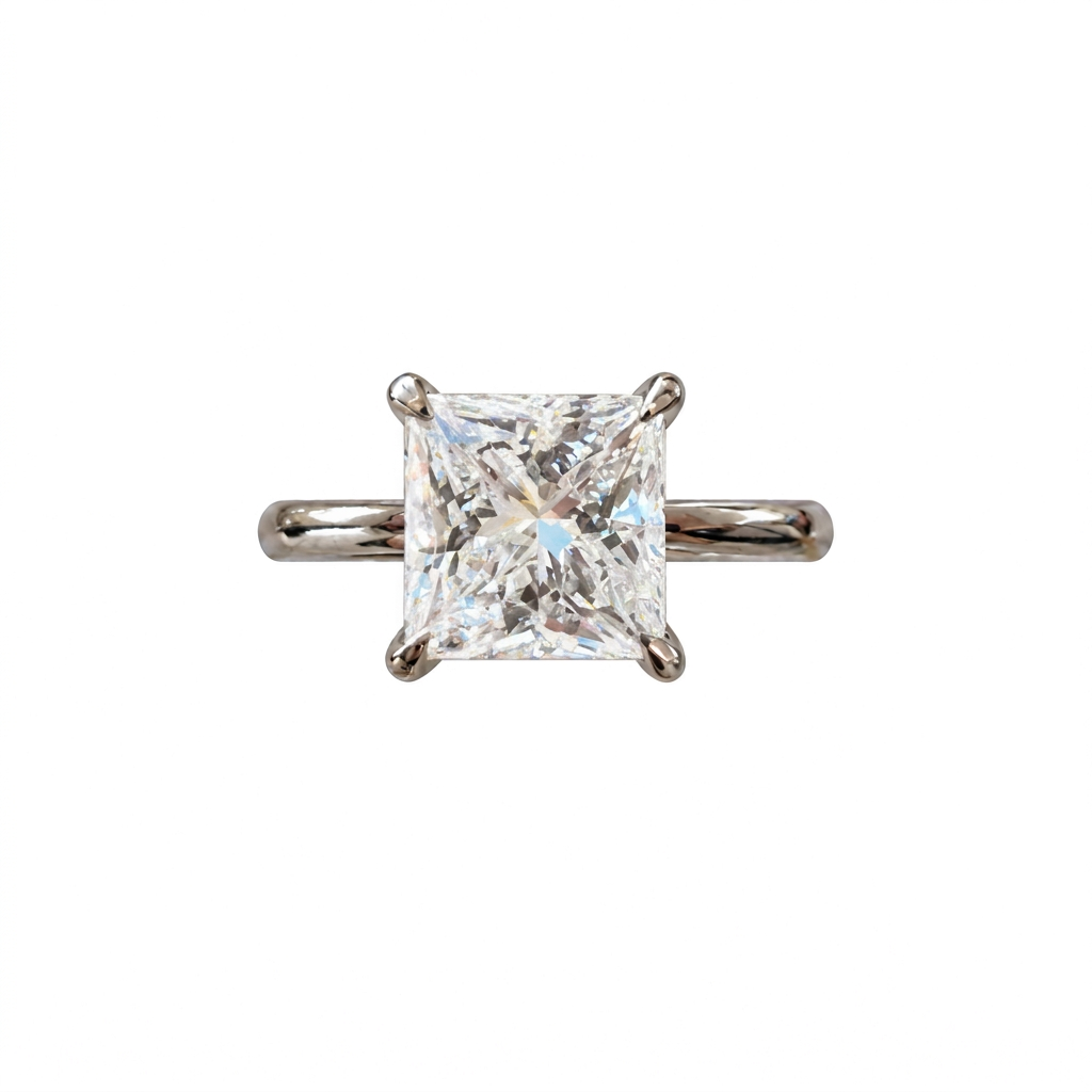 Front view of princess-cut diamond engagement ring on a white background