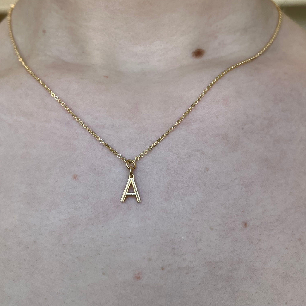 Gold Letter Charm - Nashelle