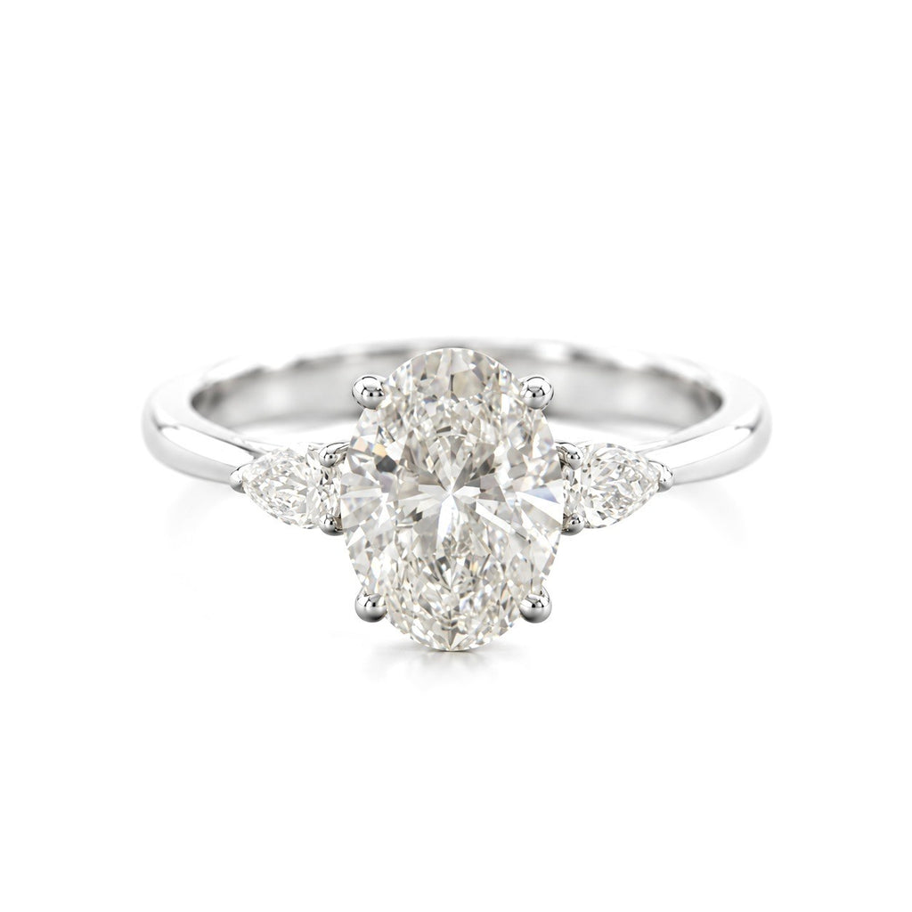 Oval Cut Diamond Engagement Ring with Pear Side Stones